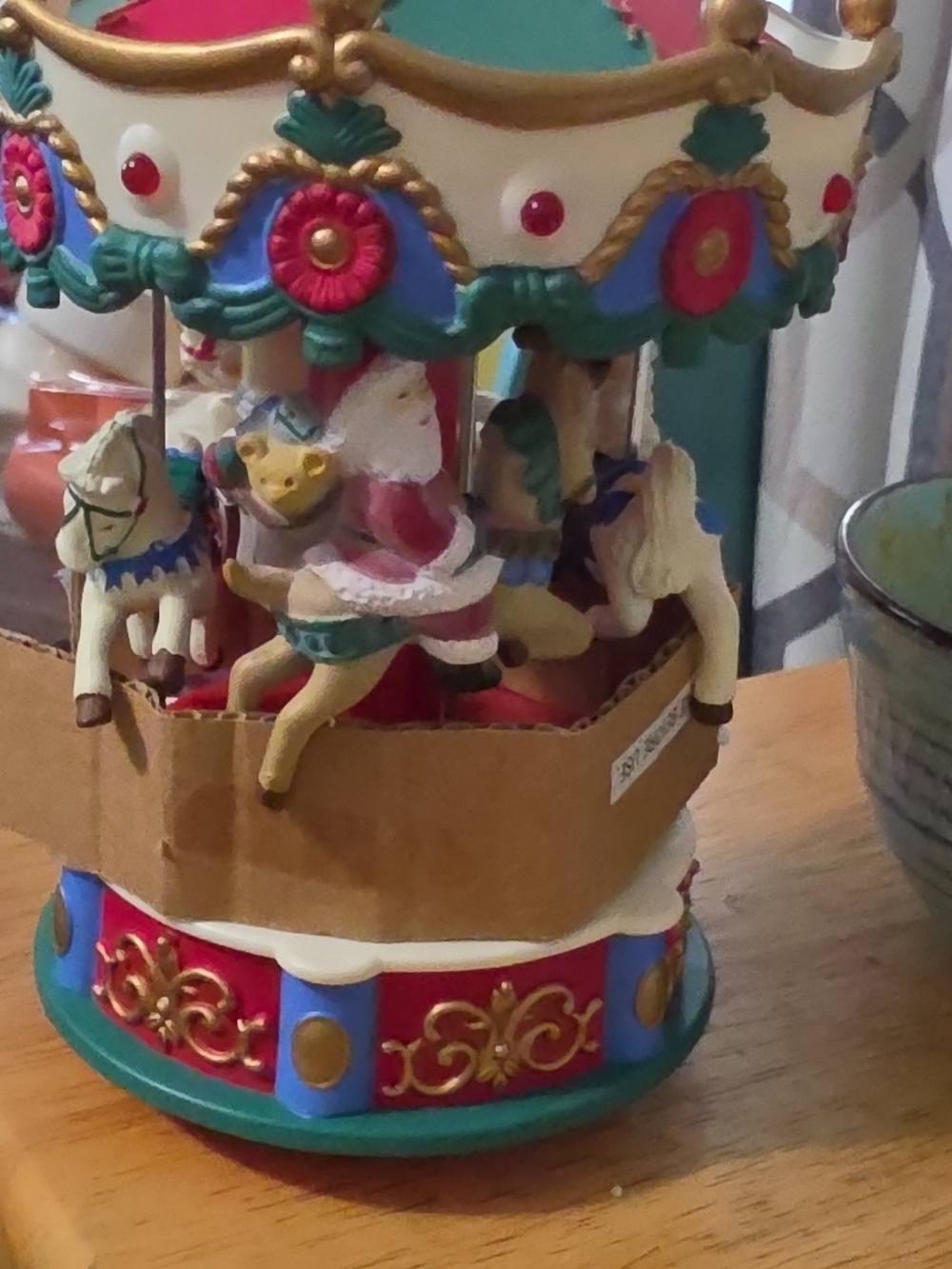 Avon Multicolor Carousel Music Box with Santa Figure
